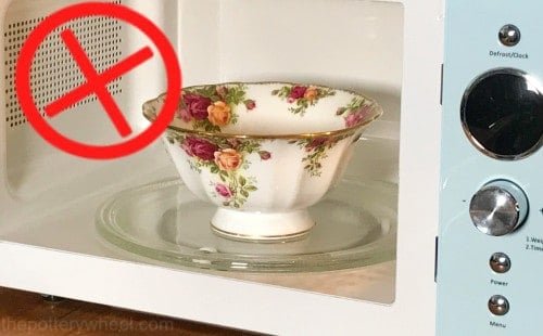 Ceramic kitchenware arranged neatly in a bright modern kitchen for a helpful FAQ guide.