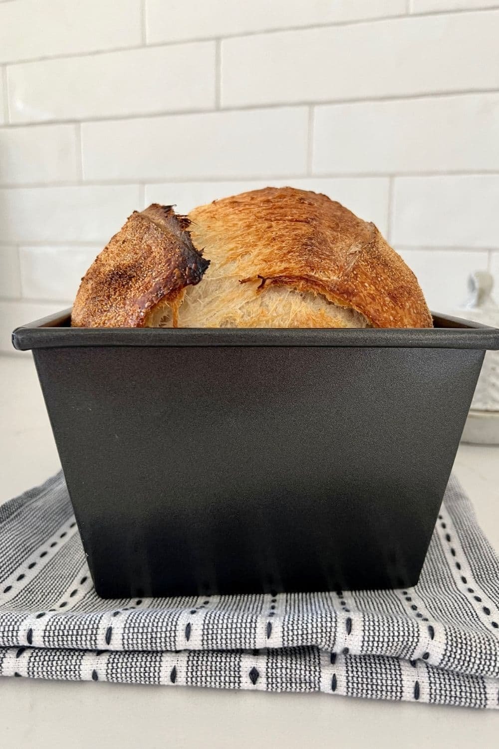 Compare sourdough loaf pans versus free-form boules for optimal bread baking results.