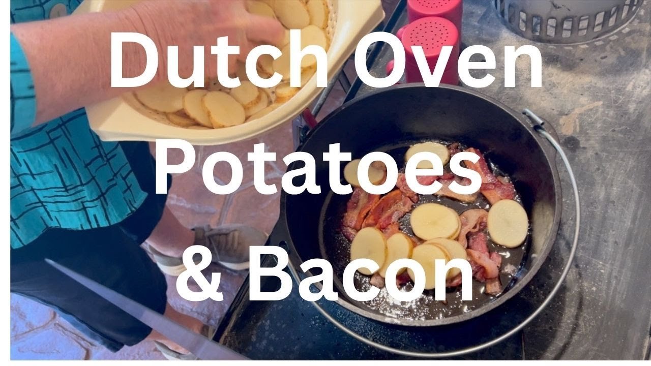 An enameled Dutch oven filled with water and potatoes for boiling.
