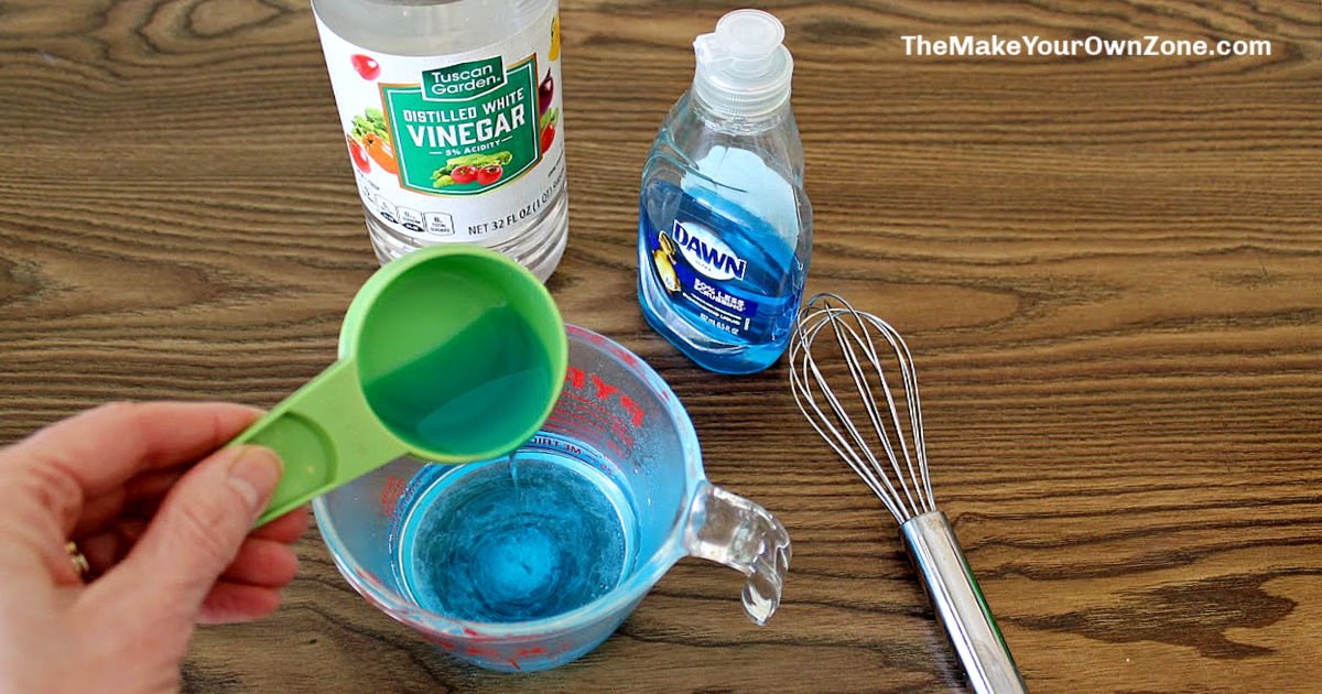 Cleaning bottles placed on a kitchen counter for home maintenance advice.