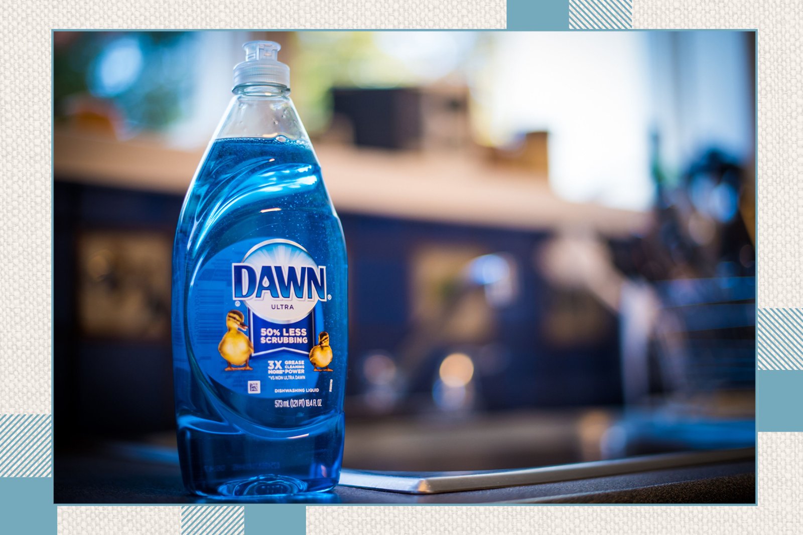 A drop of blue dish soap on a clean glazed porcelain floor tile.
