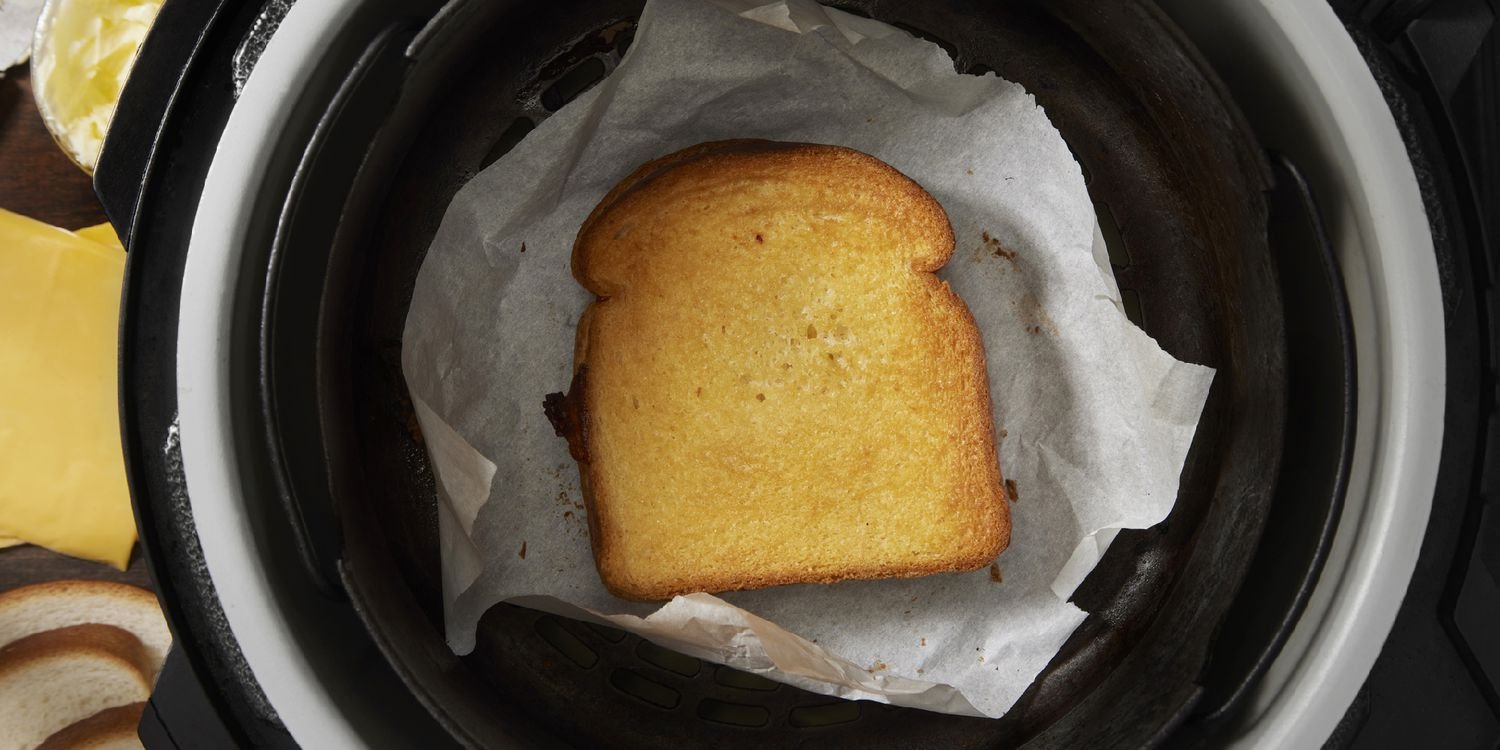 Perforated silicone mats are a safe and reusable alternative for air fryer cooking.